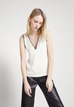 THE KOOPLES Top - Ecru 10 THE KOOPLES Top - Ecru -Havaianas Shop 57957317763f4db5ba4db48c7b690f02 scaled