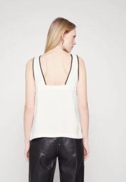 THE KOOPLES Top - Ecru 9 THE KOOPLES Top - Ecru -Havaianas Shop 6c4509449ecb4d6283b629b649785063 scaled